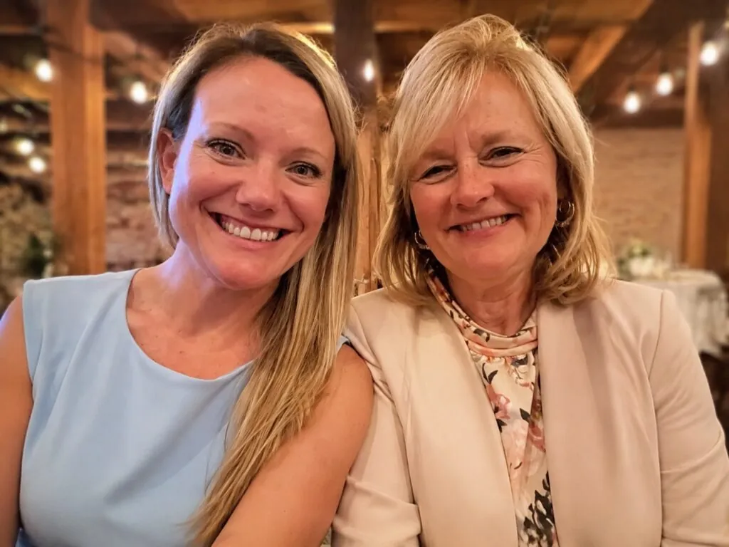 Melissa Welch, APRN, and Dr. Tressa Gardner, DO, smiling together